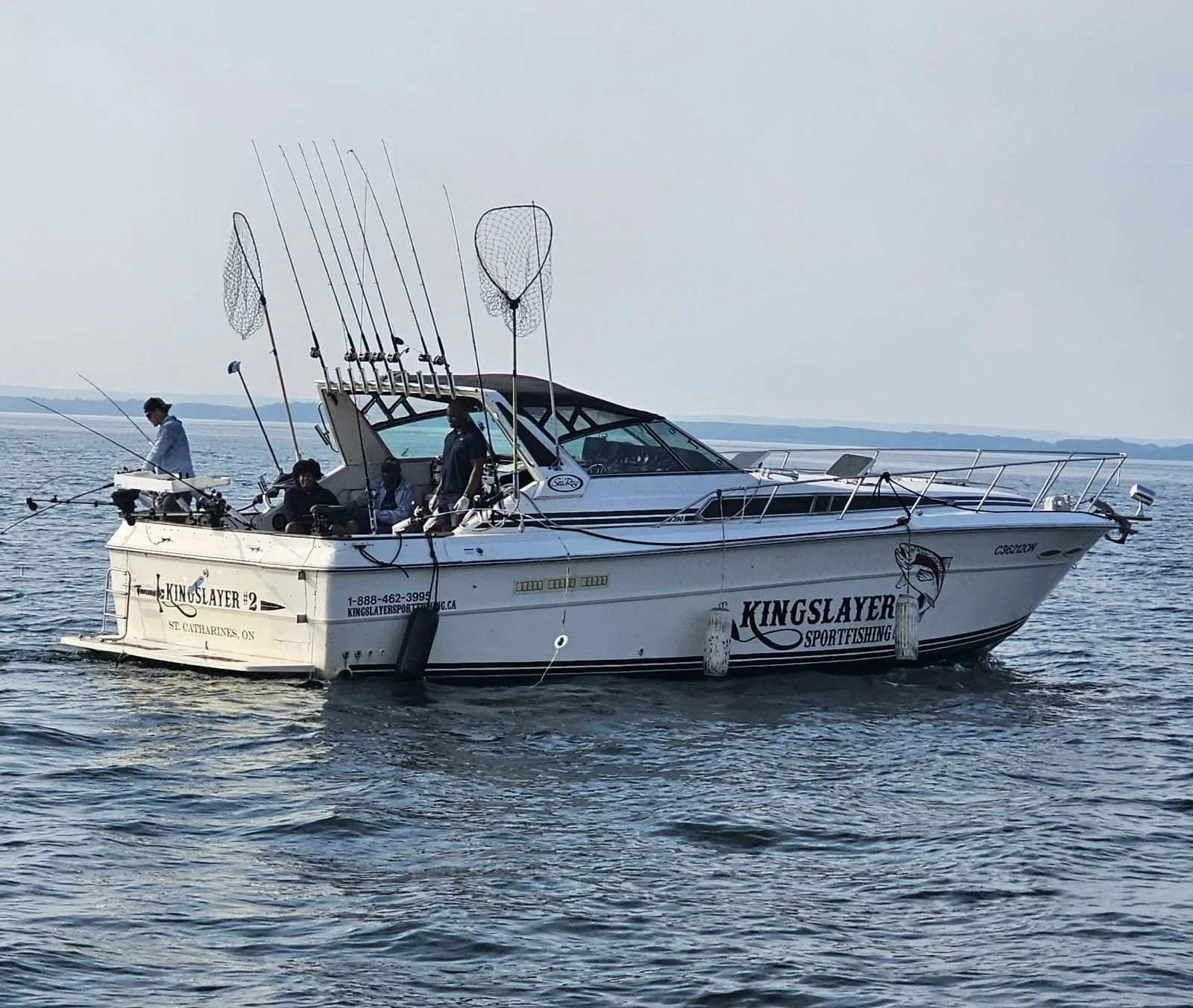 The Kingslayer #2 charter boat with full rigger spread near shore on Lake Erie