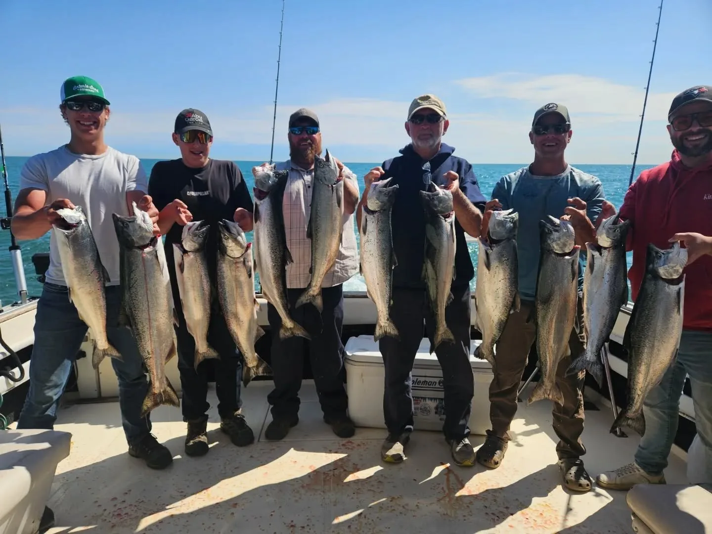 Six anglers with a full limit of chinook salmon on a sunny day